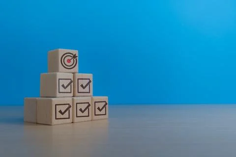 Exploration and evaluation, target board from above with check marks on woo.. Stock Photos