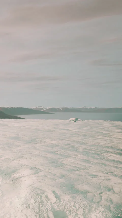 Exploration of ice fields and water at a remote coastal location Stock Footage 337966723