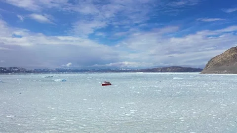 Exploration of ice fields in Greenland with a research vessel navigating  Stock Footage 328972126