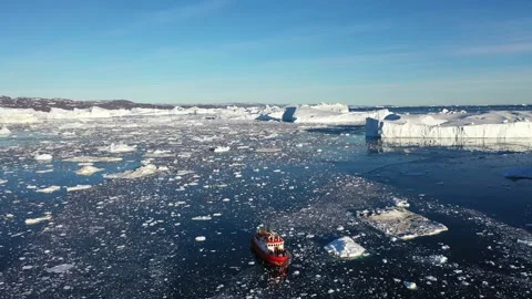 Exploration of ice fields in Greenland with a research vessel navigating  Stock Footage 328972131
