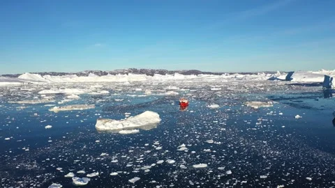 Exploration of ice fields in Greenland with a research vessel navigating  Stock Footage 328972133