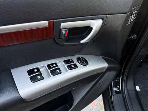 Exploration of modern car interior controls showcasing stylish window switc.. Stockfoto's
