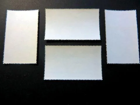 Exploration of Reverse Sides of Postage Stamps in a Philatelic Collection F.. Stock Photos
