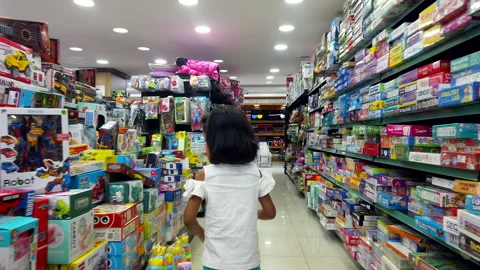 Exploration of Toy Aisle by kid Stock Footage 267034495