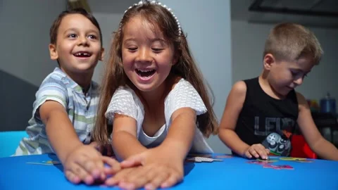 Explorative process Kindergarten students in classroom playing cognitive game Stock Footage 259156174