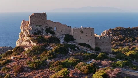 Explore the ancient ruins along the coast of Rhodes in Greece Stock Footage 318033686