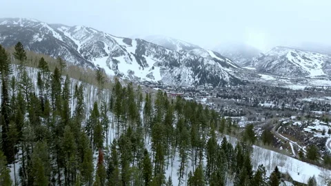 Explore Aspen Snow Town Mountains in winter wonderland setting showcasing serene Stock Footage 288067799