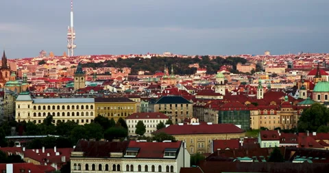 Explore the beautiful rooftops of Prague during sunset with stunning views of Video stock 283795683