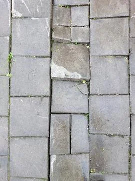 Explore the Beauty of Aged Stone Paths Amidst Nature in a Serene Urban Settin Stock Photos