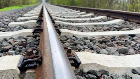 Explore the beauty of tranquil train tracks weaving through picturesque nat.. Stock Photos