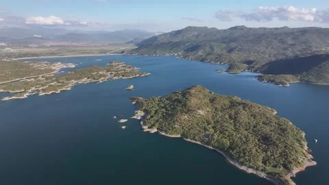 Explore the breathtaking aerial view of Slansko Lake showcasing its Stock Footage 287793112