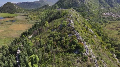 Explore the breathtaking aerial views of Skadar Lake and its stunning landscape Stock Footage 287790194