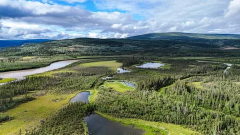 Explore the breathtaking Alaskan wilderness with pristine rivers winding through Stock Photos