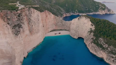 Explore the breathtaking beauty of Navagio Beach in Zakynthos, Greece for an Stock Footage 337363860
