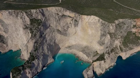 Explore the breathtaking cliffs and crystal-clear waters of Zakynthos, Greece in Stock Footage 337376213