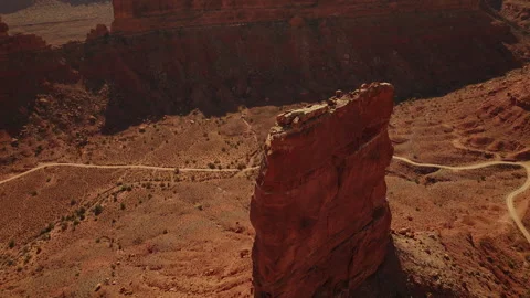 Explore breathtaking rock formations and barren cliffs in a stunning desert Stock Footage 288306387