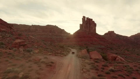 Explore the breathtaking Utah Valley of Gods Desert with a thrilling car Stock Footage 288874715