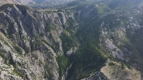 Explore the breathtaking view from above Kotor showcasing stunning mountains and Stock Footage 287756835