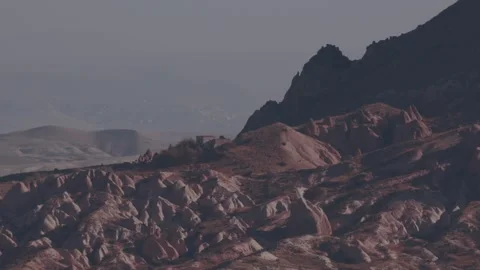 Explore Cappadocias unique rock formations and ancient landscape in Turkey Stock Footage 336806500