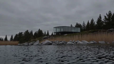 Explore the captivating and modern architectural design beautifully situated by Stock Footage 303723877