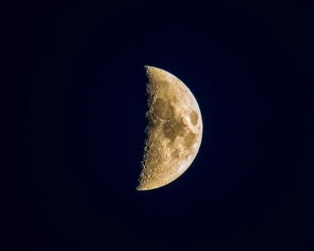 Explore the captivating beauty of our celestial neighbor with this stunning c Stock Photos