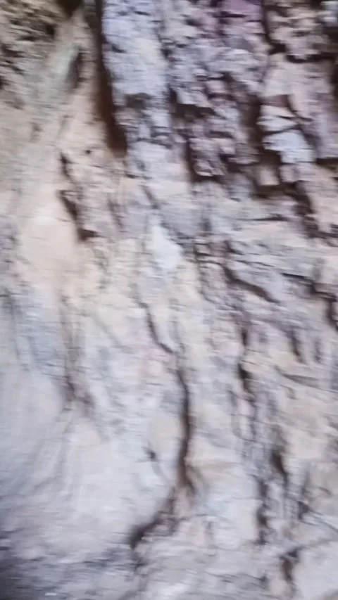 Explore a cave in the middle of the mountain Video stock 163684443