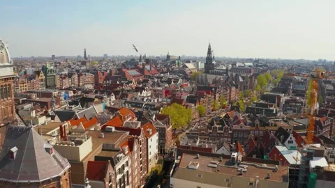 Explore the Charm of Amsterdam's Streets in 4K Aerial Footage Stock Footage 275333058