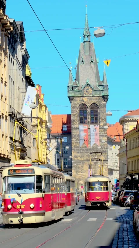 Explore the charm of Prague with iconic trams and historic architecture Stock Footage 332857180