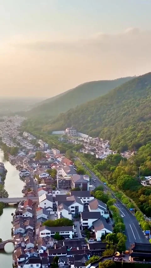 Explore the cityscape of Changshu in Jiangsu from drone view Vídeos de archivo 335074763
