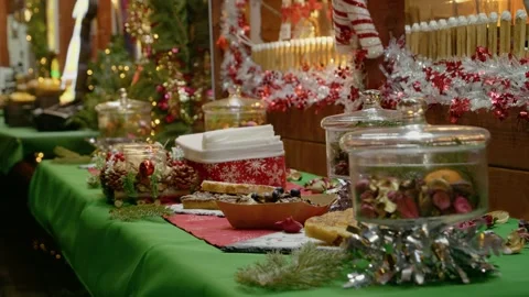 Explore delicious sweets and desserts at the Christmas market in Romania Stock Footage 313619167