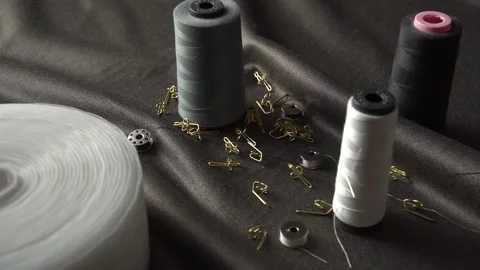 Explore diverse sewing supplies, including threads and accessories designed for Stock Footage 310248542