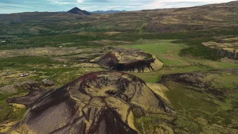 Explore the dramatic landscapes of Icelands volcanic craters under a stunning Stock Footage 319415071
