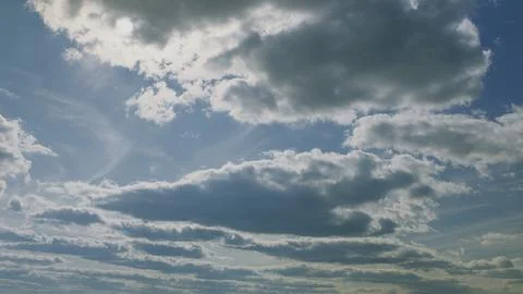 Explore the Dynamic Cloudscapes Set in a Beautifully Vibrant Sky Over the Earth Stock Photos