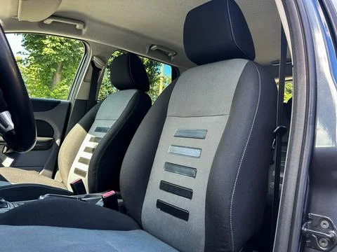 Explore the elegant design of a car interior with modern upholstery, striking Stock Photos