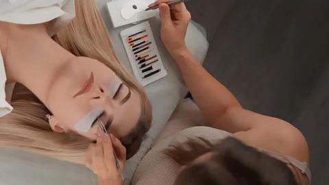 Explore the exclusive range of materials used for eyelash extensions. From light Stock Footage 262341447