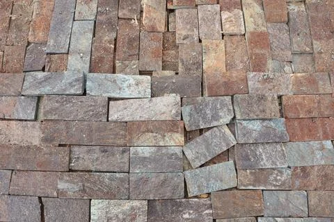 Explore an exquisite textured stone paving pattern ideal for enhancing outdoor 스톡 사진