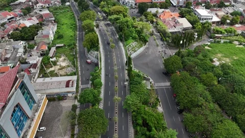 Explore Gresik Cityscapes from the Flyover Perspective Stock Footage 313106474