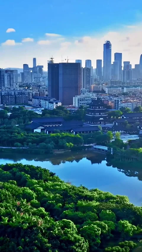 Explore guangzhou city with drone view of skyscrapers and landscape Vídeos de archivo 335073724