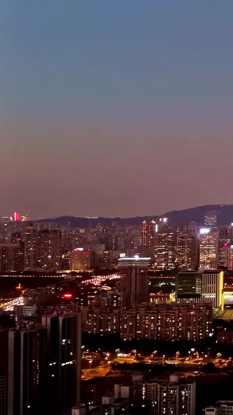 Explore Guangzhou City at night from a drone's view over the skyline Vídeos de archivo 335073711