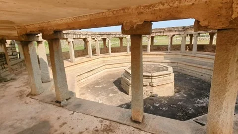 Explore Hampi's Iconic Octagonal Bath: A Blend of History and Architecture. Stock Footage 301910312