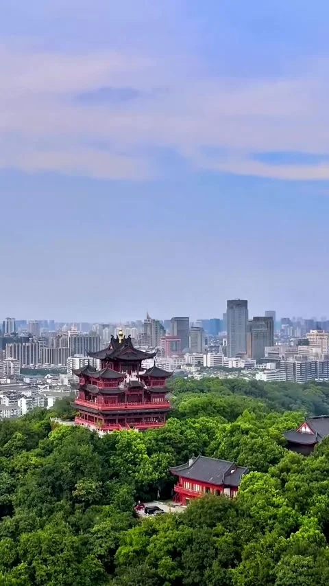 Explore Hangzhou City and its Chenghuangge Pavilion from a drone view Stock Footage 335073326