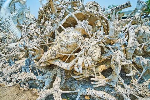 Explore hell scenes at White Temple, Chiang Rai, Thailand Stockfoto's