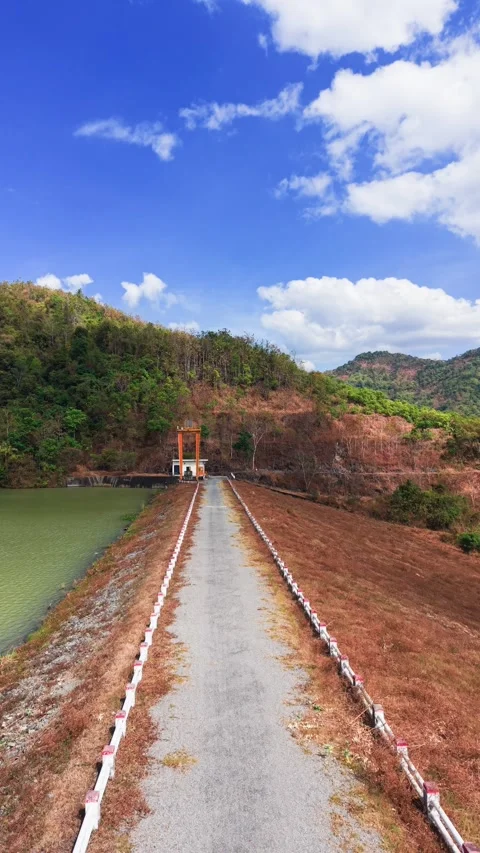 Explore the Đại Ninh Pass with an aerial view of the landscape and pathway Видео 333669952