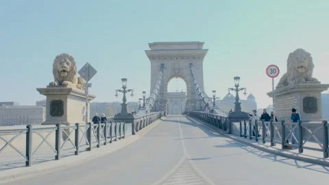 Explore the iconic Chain Bridge in Budapest on a sunny day filled with joy and Stock Footage 333507647