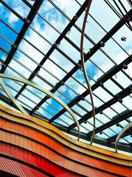 Explore innovative modern architecture with expansive glass ceilings that f.. Stock Photos