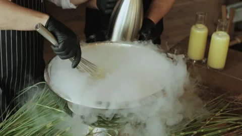 Explore the Innovative Techniques of Molecular Gastronomy in Action at Stock Footage 283451018