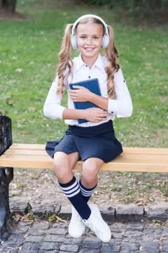 Explore knowledge. using headset technology. old school music. back to school Stock Photos