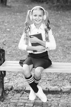 Explore knowledge. using headset technology. old school music. back to school Stock Photos