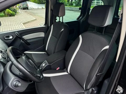 Explore the luxurious car interior with unique patterned seat covers that enh Stock Photos