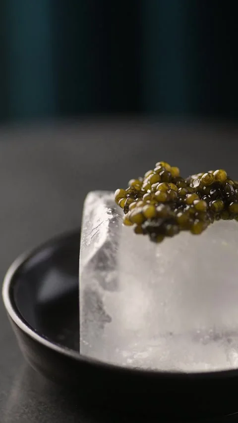Explore luxurious delicacies with this close-up of Beluga caviar, elegantly Video stock 330616406